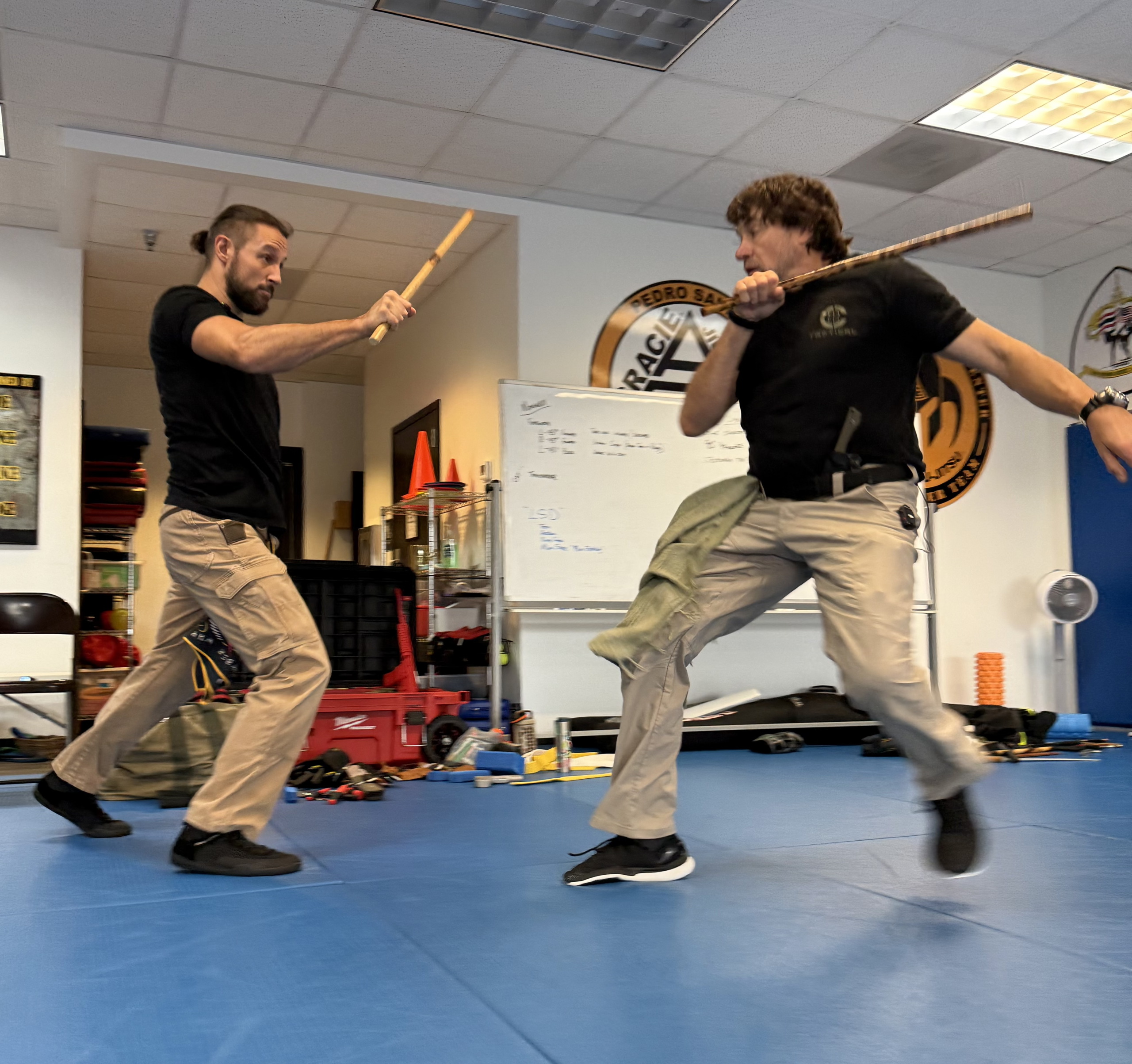 C-Tac instructors practicing impact weapon movement during camp