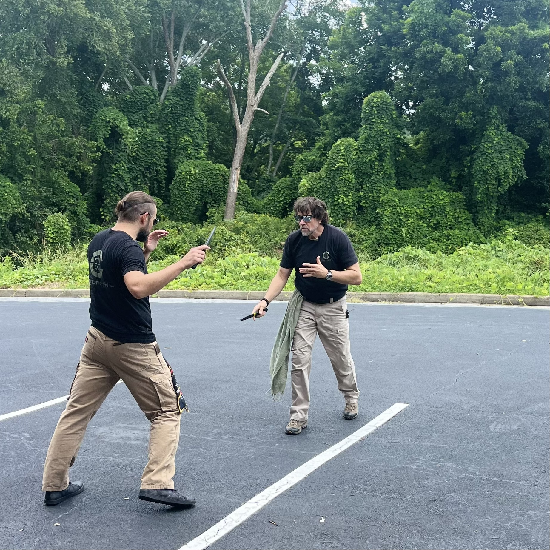 C-Tac instructors drilling edged-weapon movement in an outdoor environment